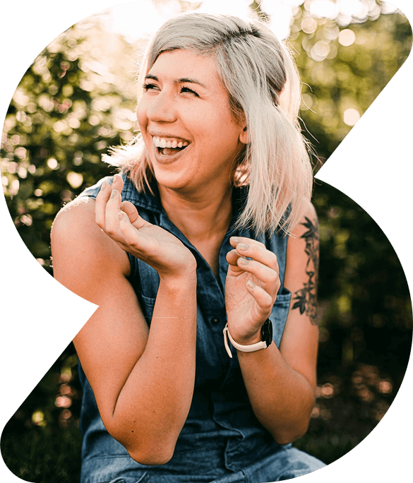 Woman in black tank top smiling photo